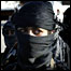 A member of the Mehdi Army takes part in a parade in Sadr City, Baghdad (5 Aug 2006)